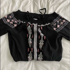 Black romper with embroidery